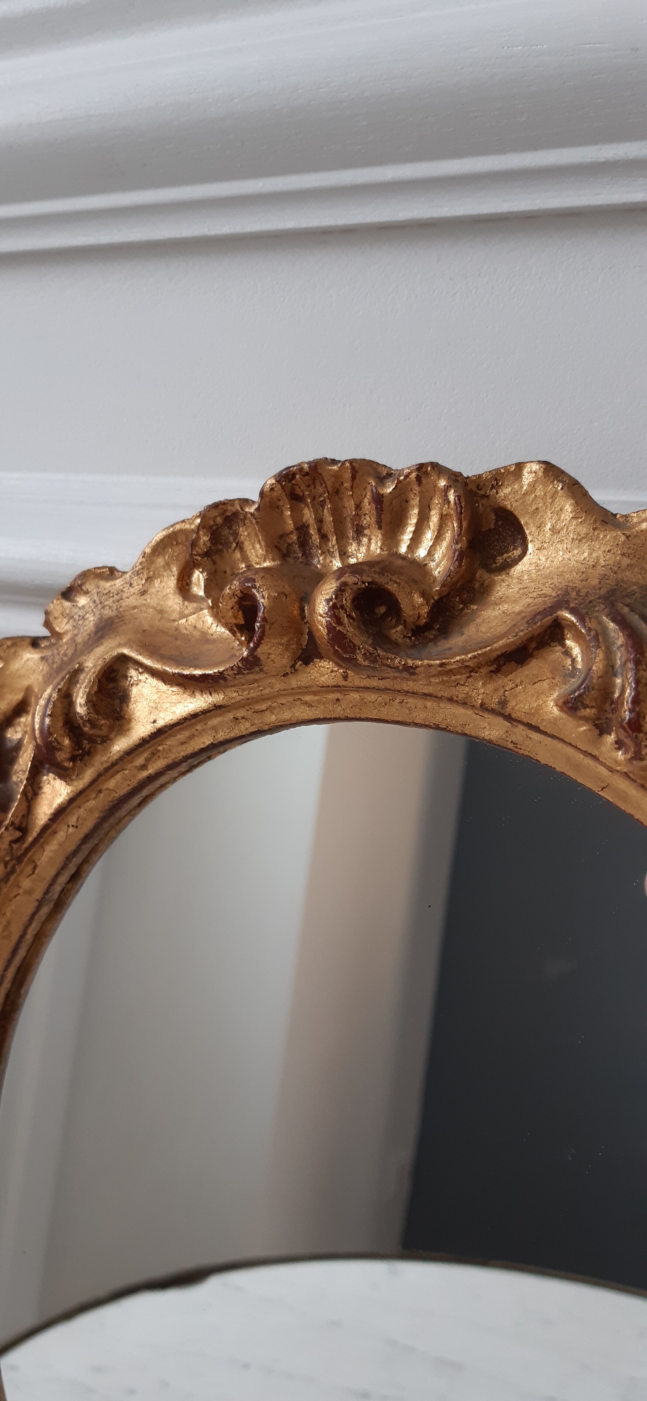 Old mirror in gilded wood late nineteenth