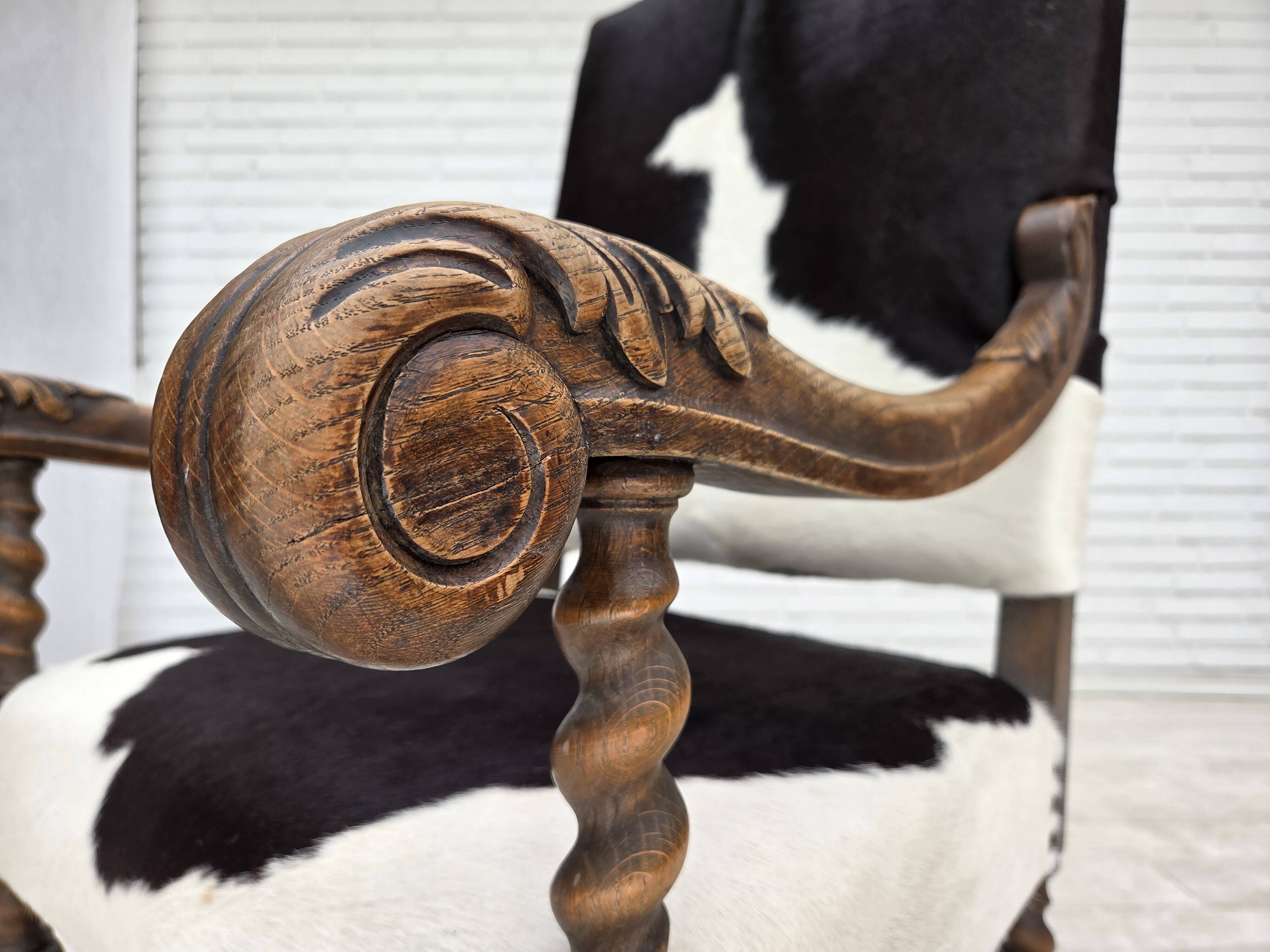 1950s, Danish highback armchair, genuine cowhide, oak wood.