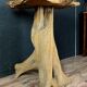 Design of the 70s: high table called "eating standing" in tree root