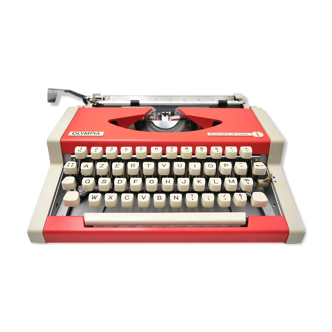 Machine à écrire Olympia Orange Saumoné vintage révisée avec ruban neuf