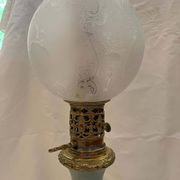 Oil lamp in celadon and bronze with its original glass globe, 19th century.