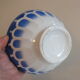 Vintage blue ribbed bowl on pedestal