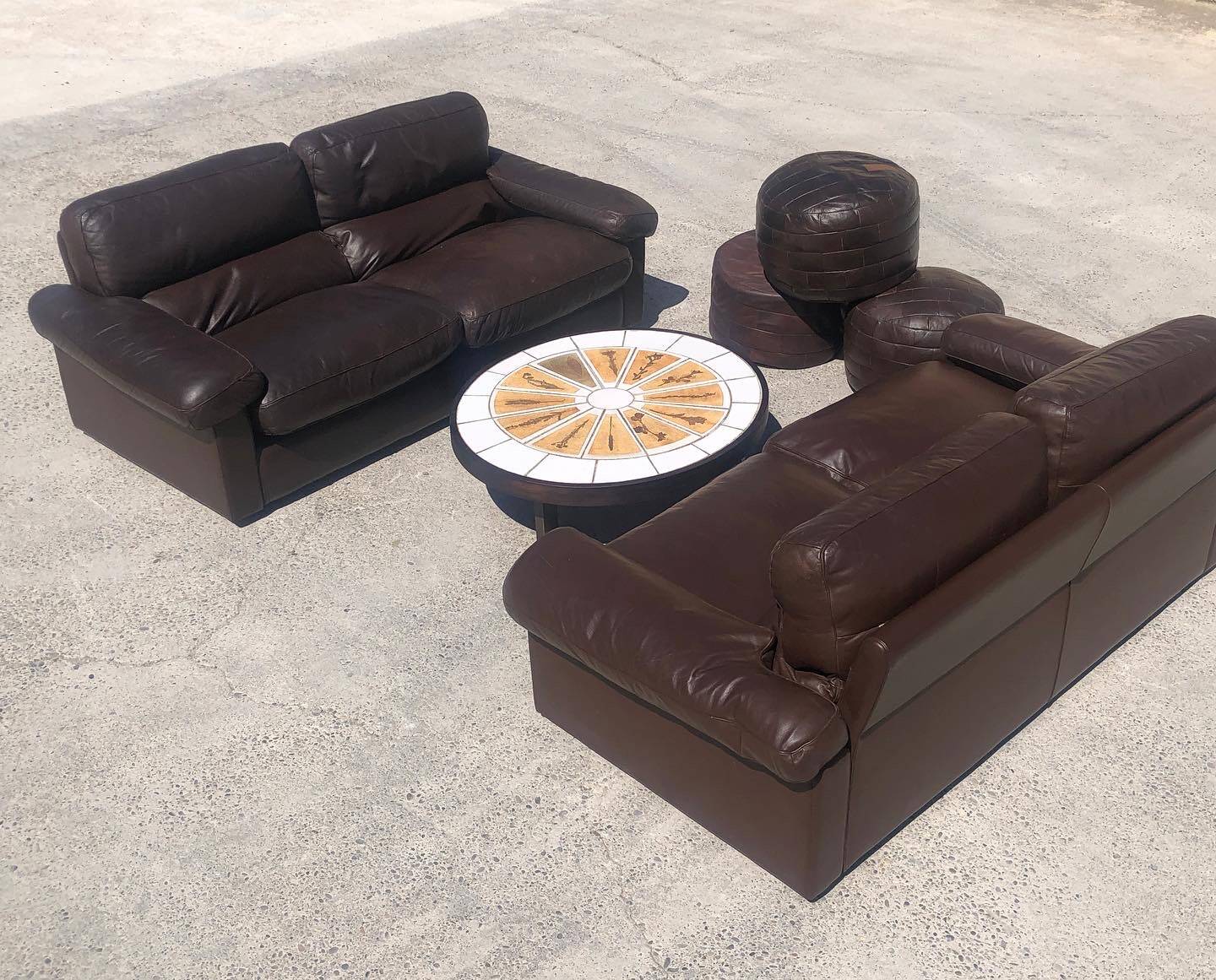 Pair of leather sofas model "Petronio" by Tito Agnoli for Poltrona Frau