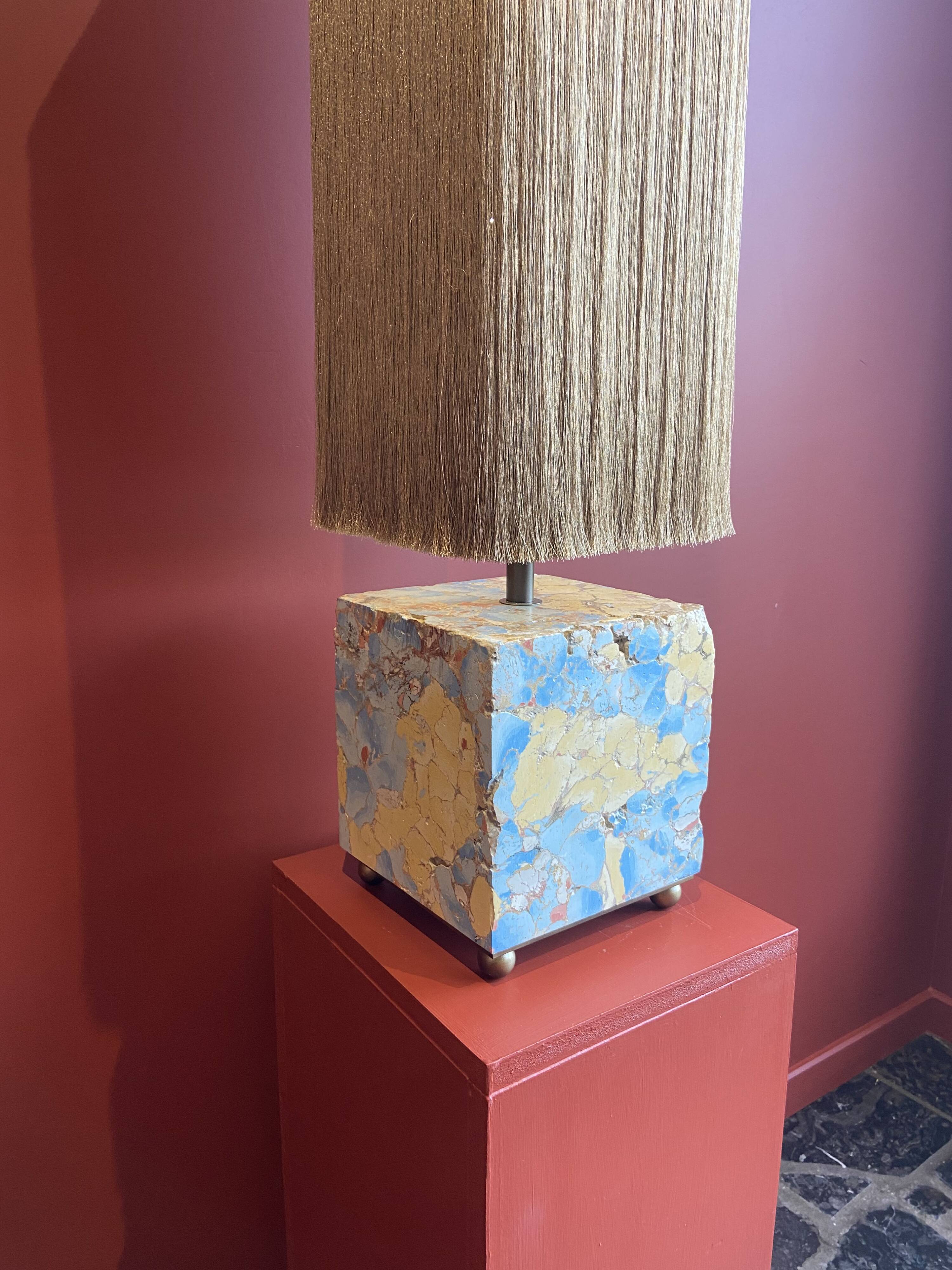 Base stuck blue beige marble-plaster, fringed lampshade Houles, 21st century.