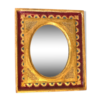 Miroir florentin en bois doré rouge
