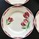 Set of 4 plates with tulip decoration.