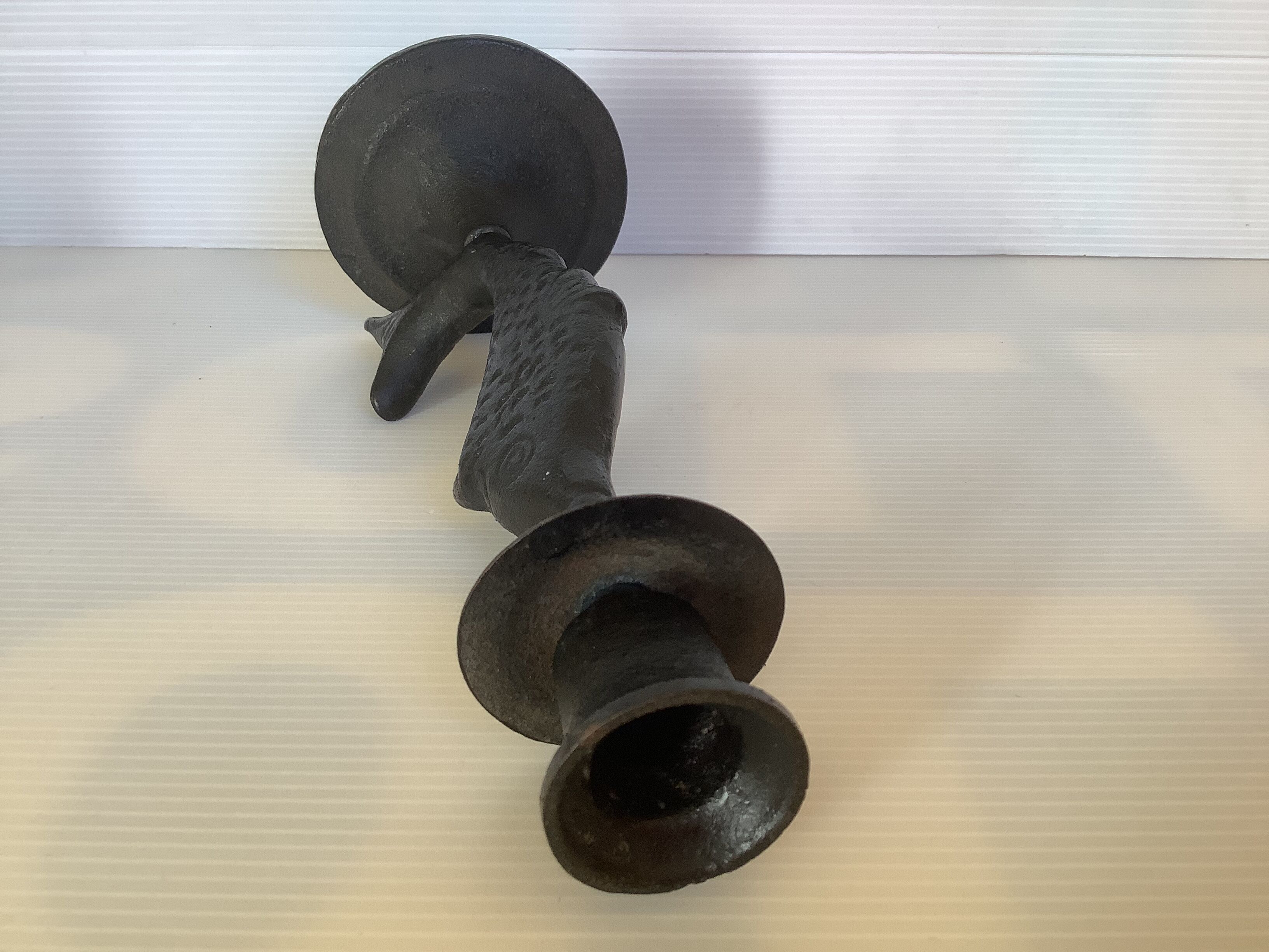 Brutalist black cast iron fish candle holder