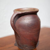 Pot in Norman sandstone of Ger