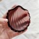 Vintage shell-shaped glass bowl in purple.