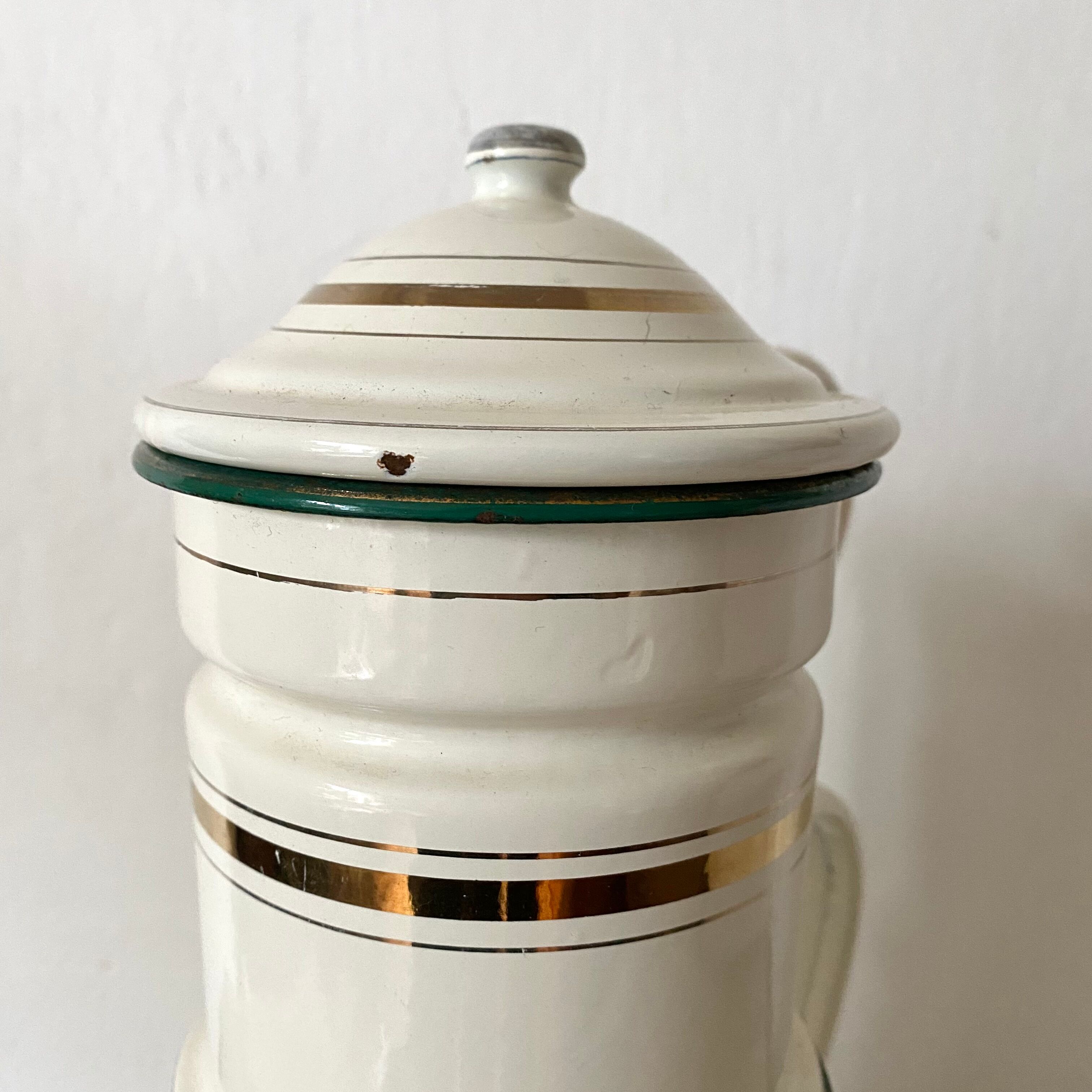 Antique coffee maker in enamelled sheet metal