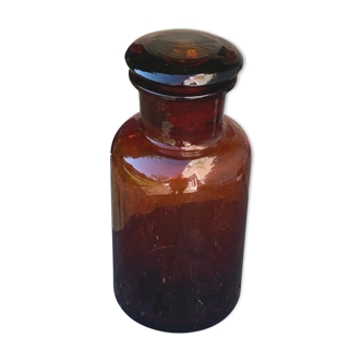 Jar bottle of herbalism pharmacy in amber colored glass art deco