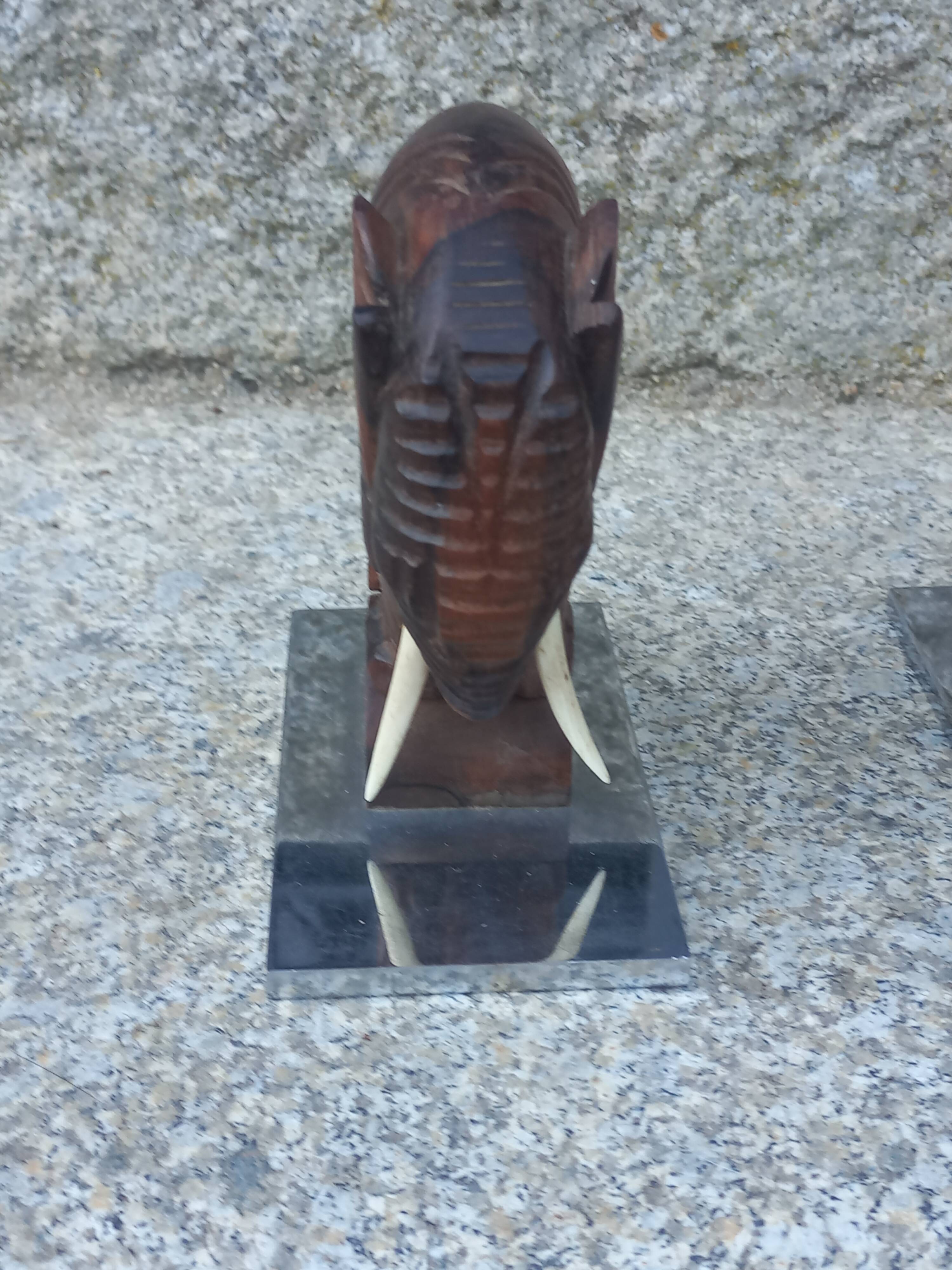 Pair of Art Deco elephant bookends in rosewood with chrome base.