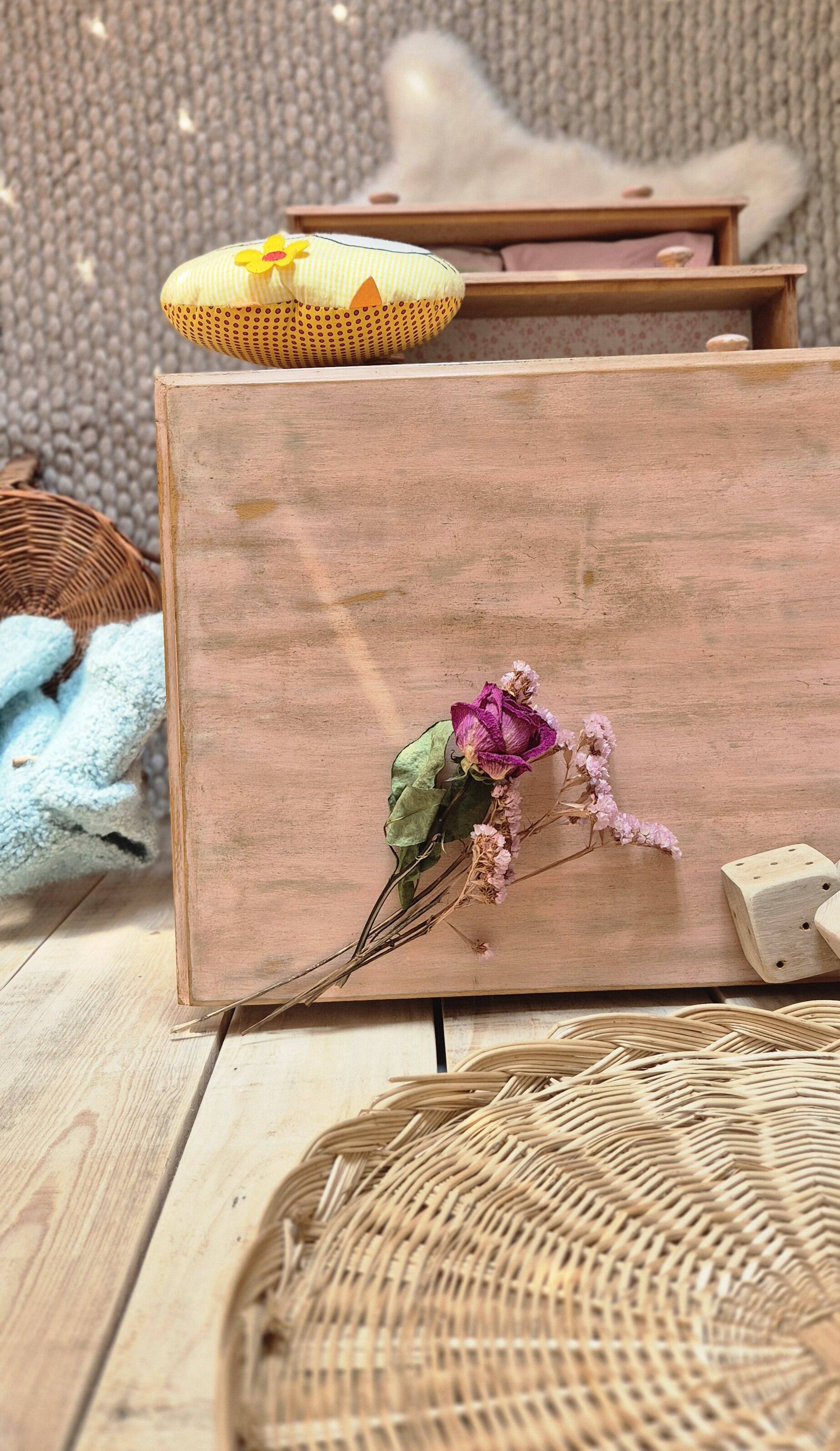 Small Parisian-style chest of drawers patinated in pink.
