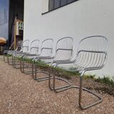 Set of 6 designer chairs in chromed metal from the 1970s