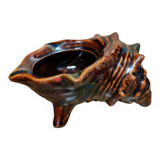 The shell-shaped trinket dish in Vallauris style.