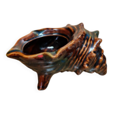 The shell-shaped trinket dish in Vallauris style.