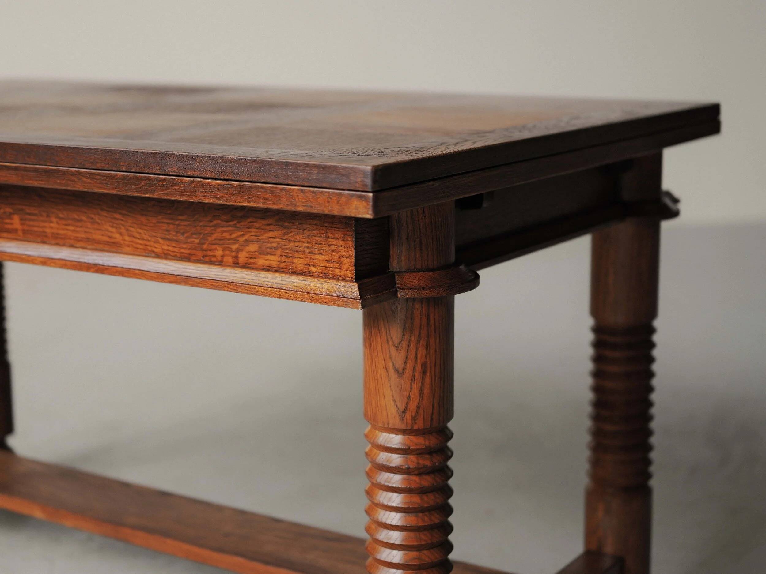 Modernist oak dining table, France, 1940–1950