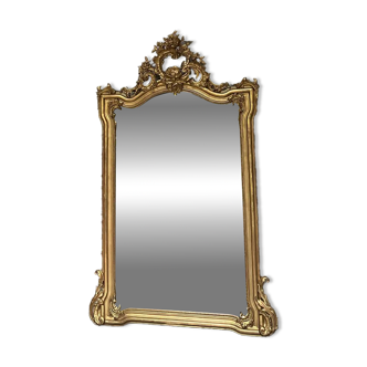 Antique mirror 169/105cm with pediments and pearl detailing in gold leaf.