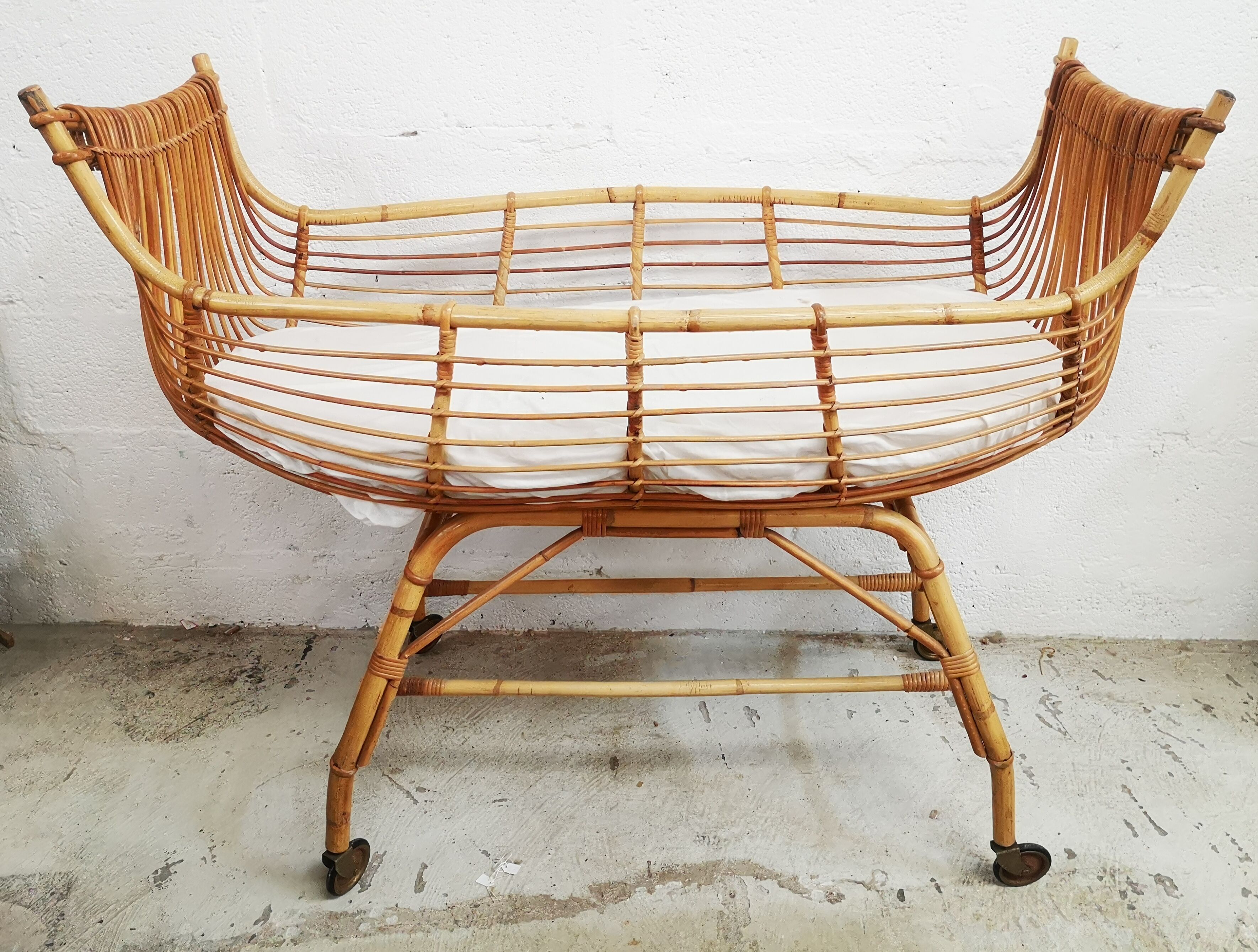 Vintage rattan cradle