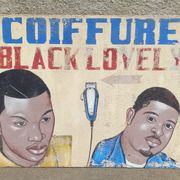 Ancienne enseigne de coiffeur africain