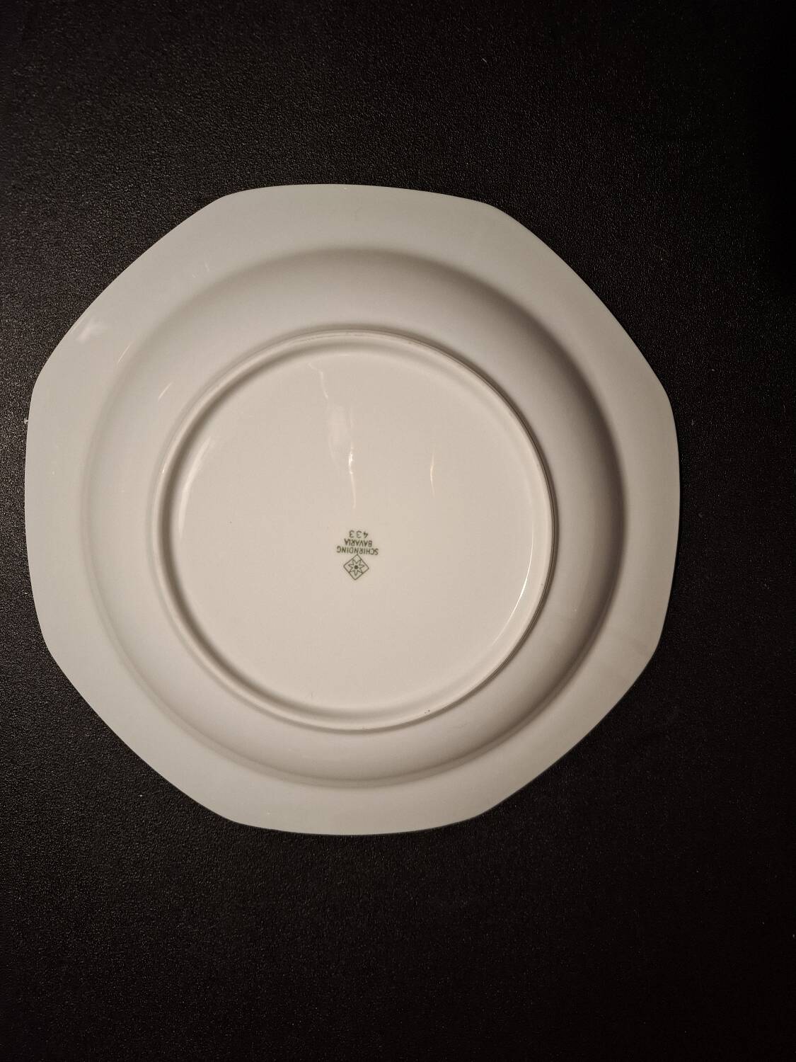 Dishes and porcelain sauceboat