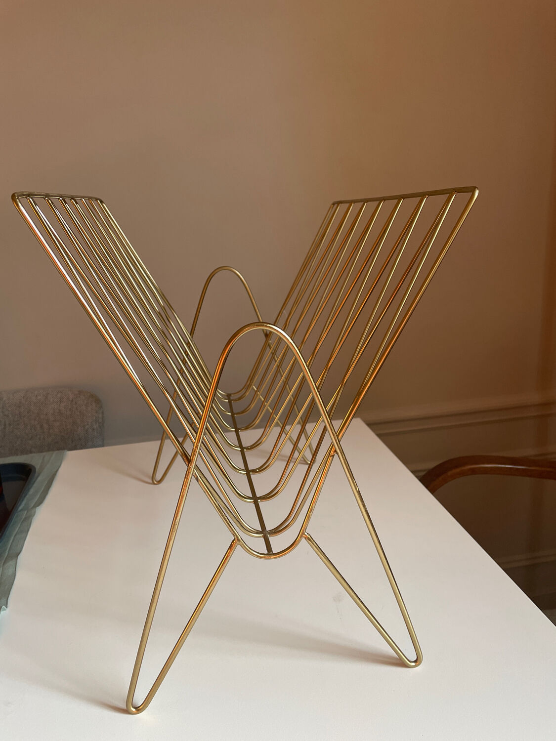 Golden brass magazine holder