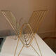 Golden brass magazine holder