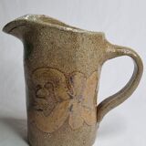 Handcrafted glazed stoneware pitcher decorated by hand