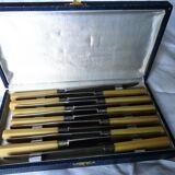 box of 12 stainless steel knives with bakelite handle and silver metal ferrule art decp