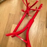 Red Baumann parrot coat rack