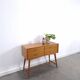 Vintage teak Danish chest of drawers with high slanted legs, side table, sideboard.