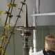 Old church candlestick in silver-plated metal