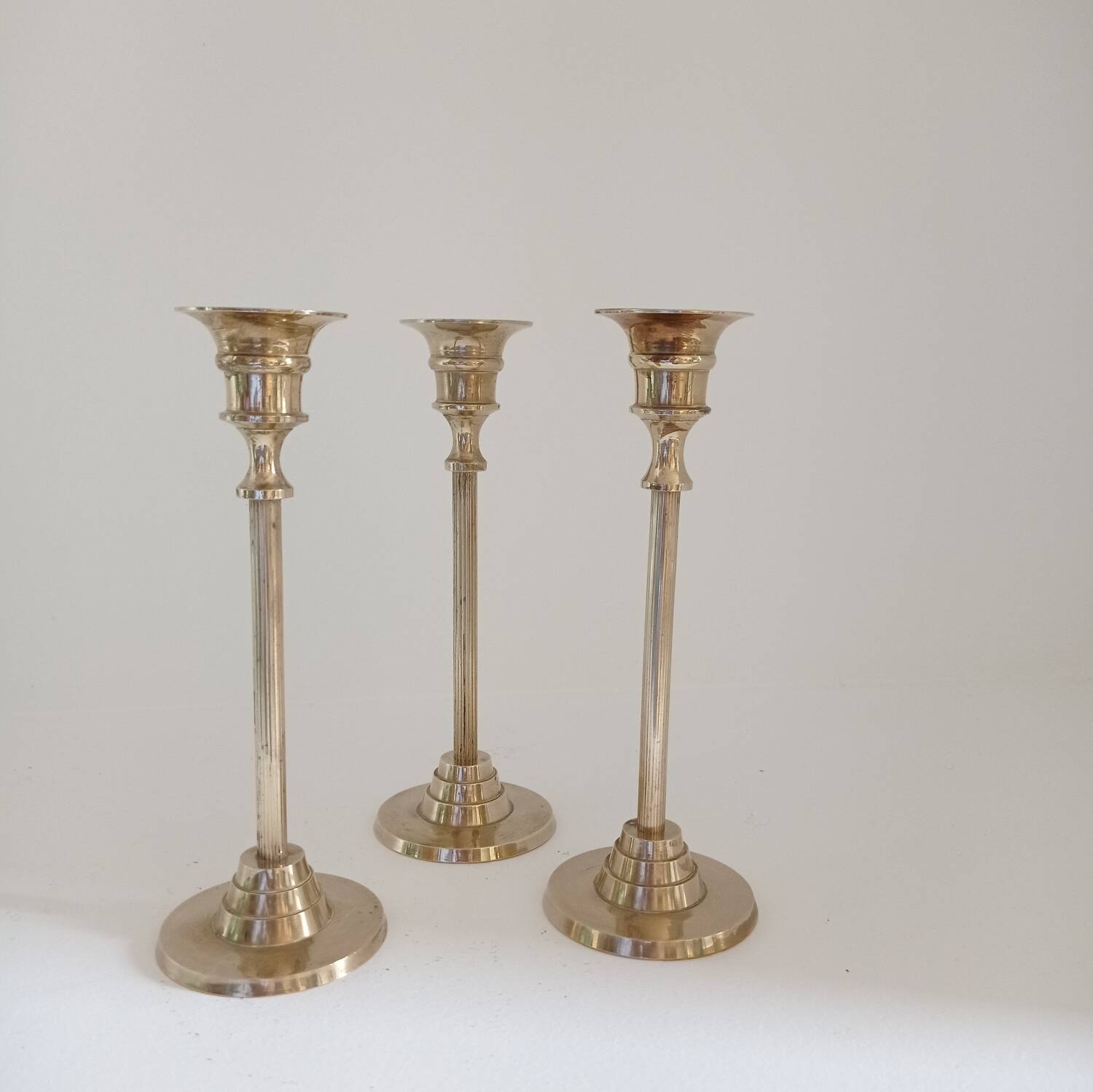 Set of 3 golden brass candle holders