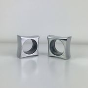 Pair of egg cups or space age napkin rings in aluminium, 1970s.