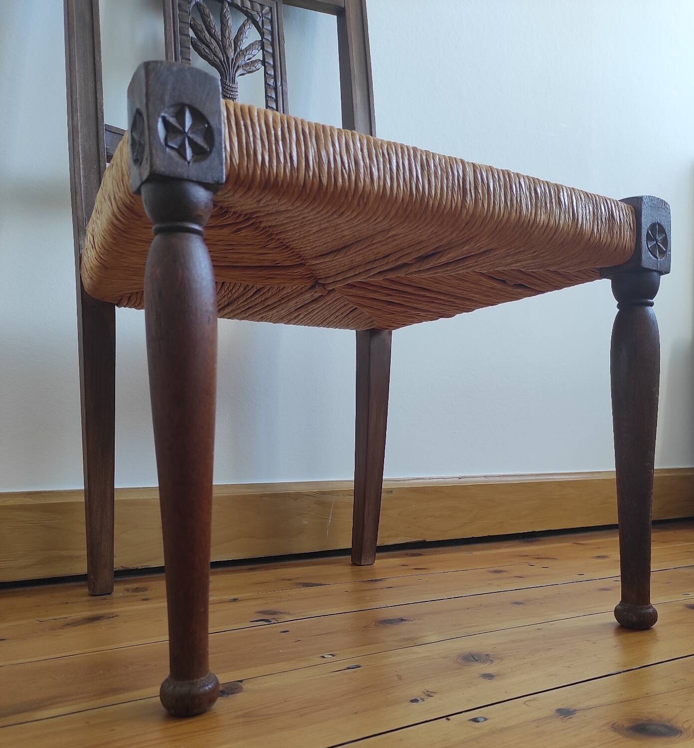 Armchair, low carved chair from the 19th century - decorated with wheat ears.