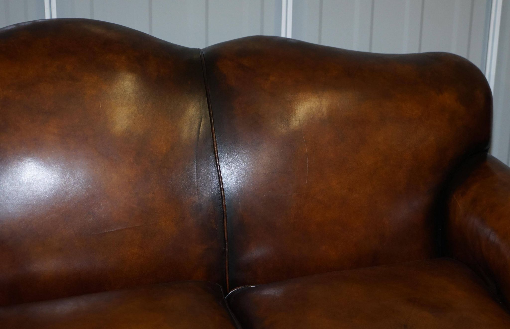 Restored vintage leather sofa from a gentleman's Victorian club.