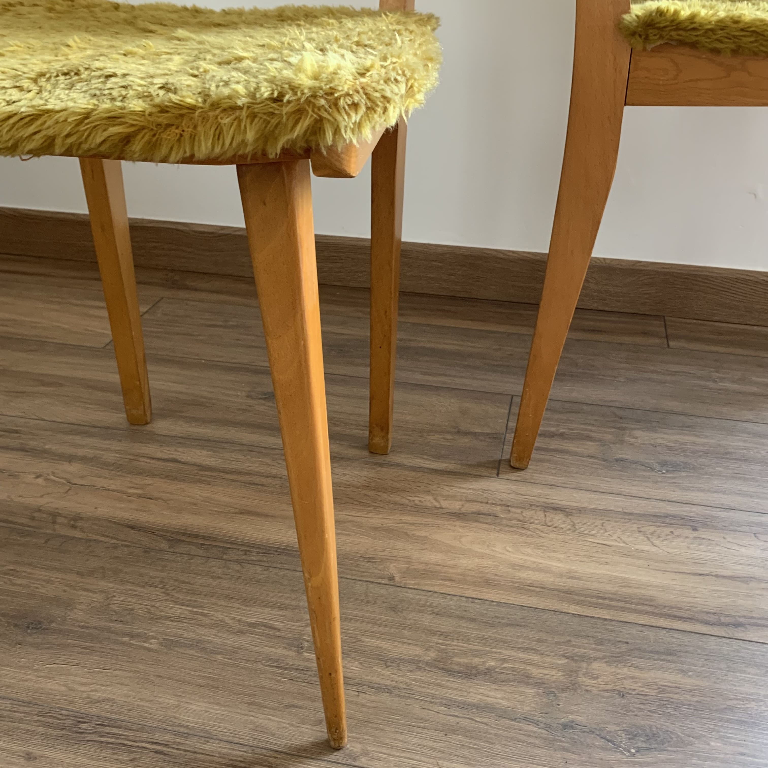 2 yellow moumoute chairs