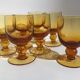 7 Amber stemmed glasses