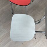 10 mismatched multicolored Formica chairs 60s