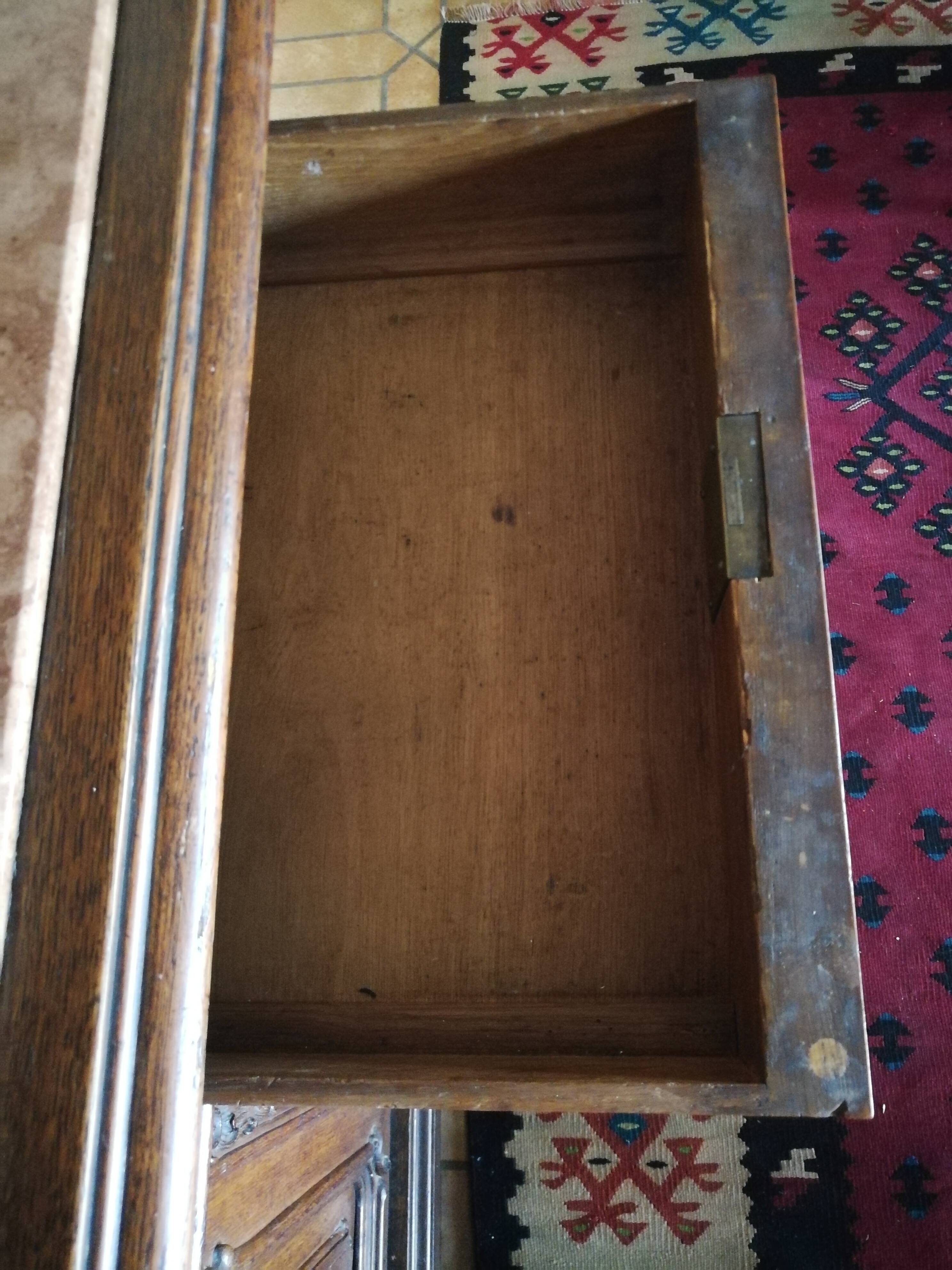 Buffet from the late 19th century with pink-brown marble in Louis XV style.