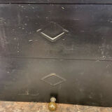 Marble fireplace surround with closed hearth frame.