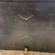 Marble fireplace surround with closed hearth frame.
