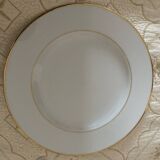 White porcelain dinner plates with a golden thread