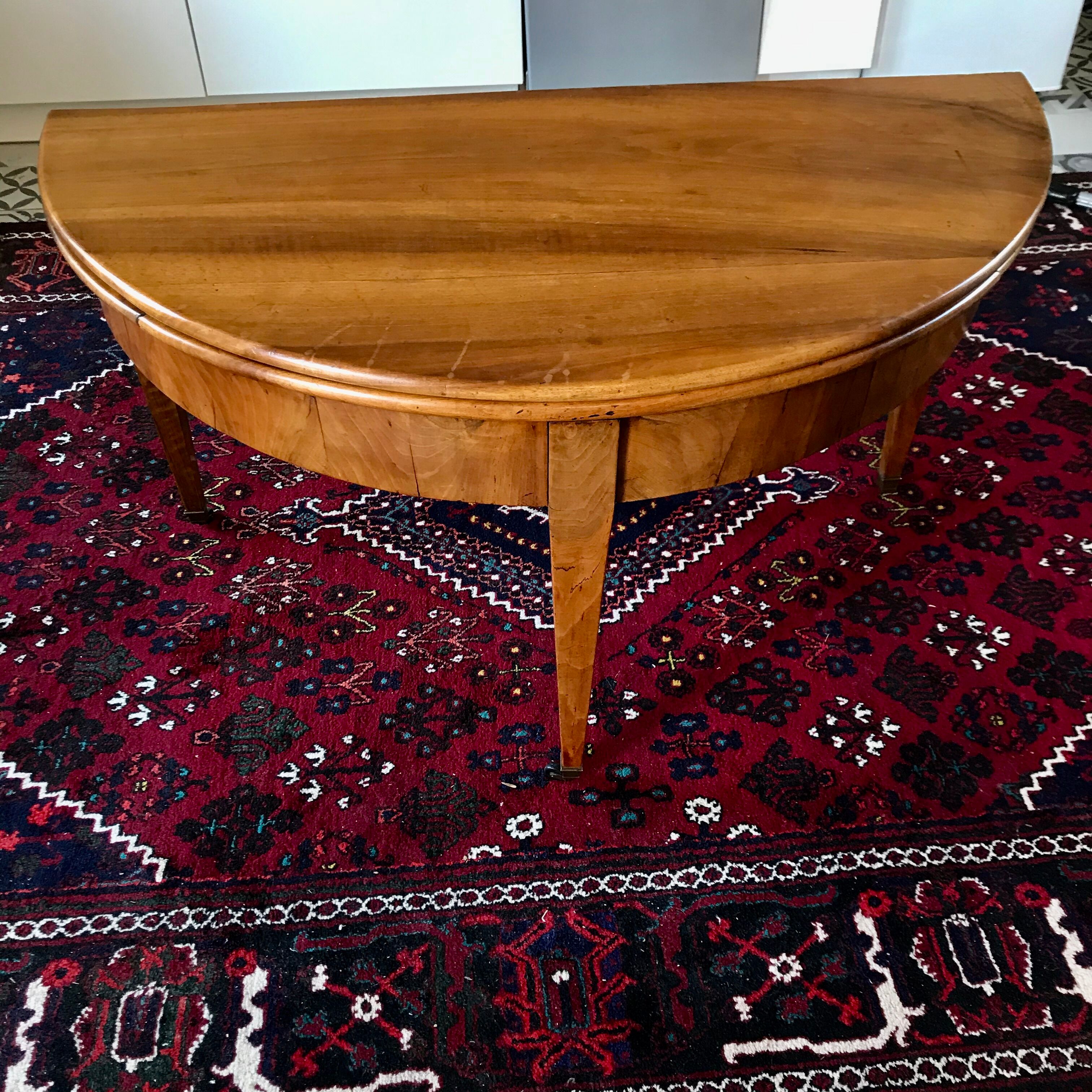 Antique half moon table in walnut