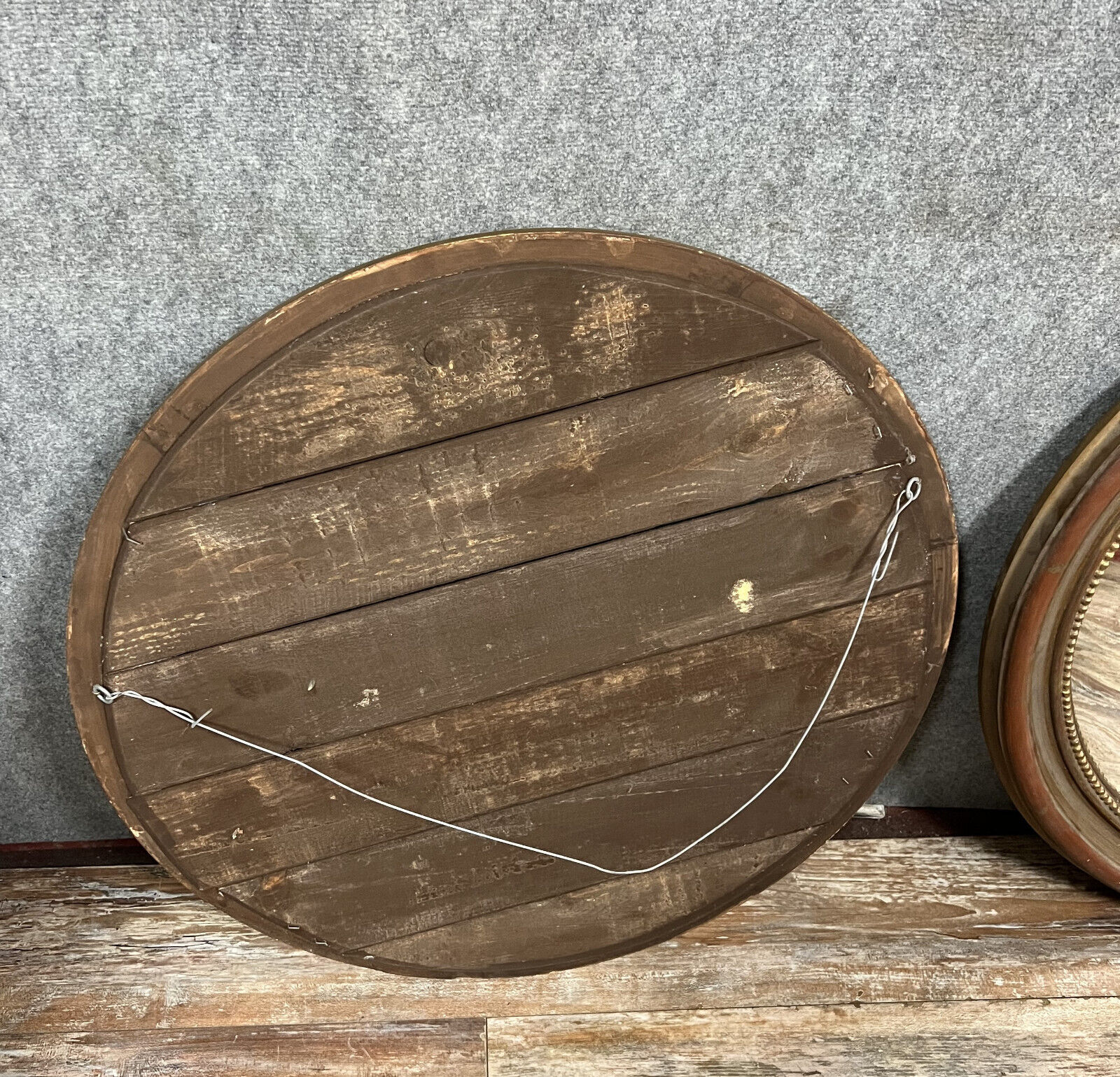 Pair of mirrors called "witch's eye" with patinated golden frame style Napoleon III