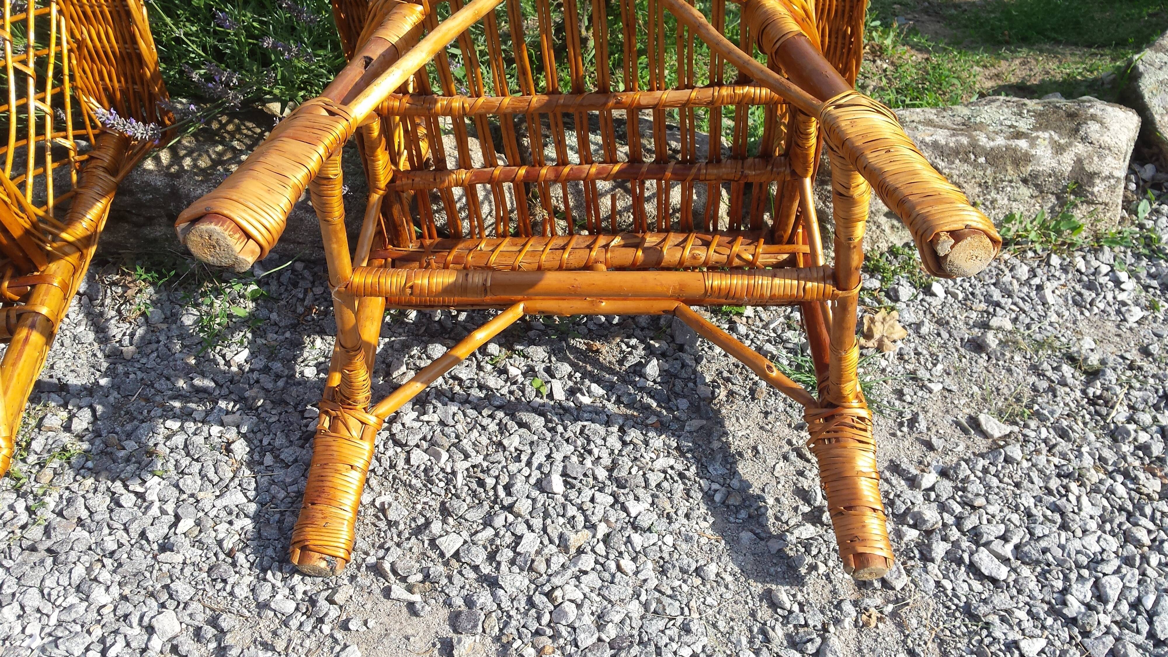 Wicker or rattan armchairs