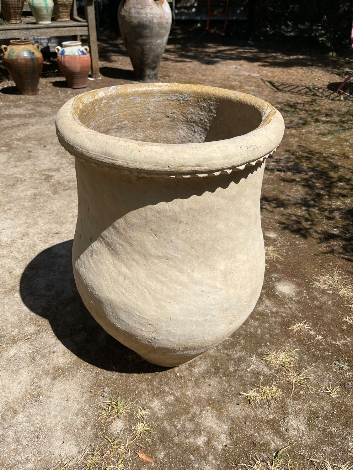 Ancient terracotta pottery jar