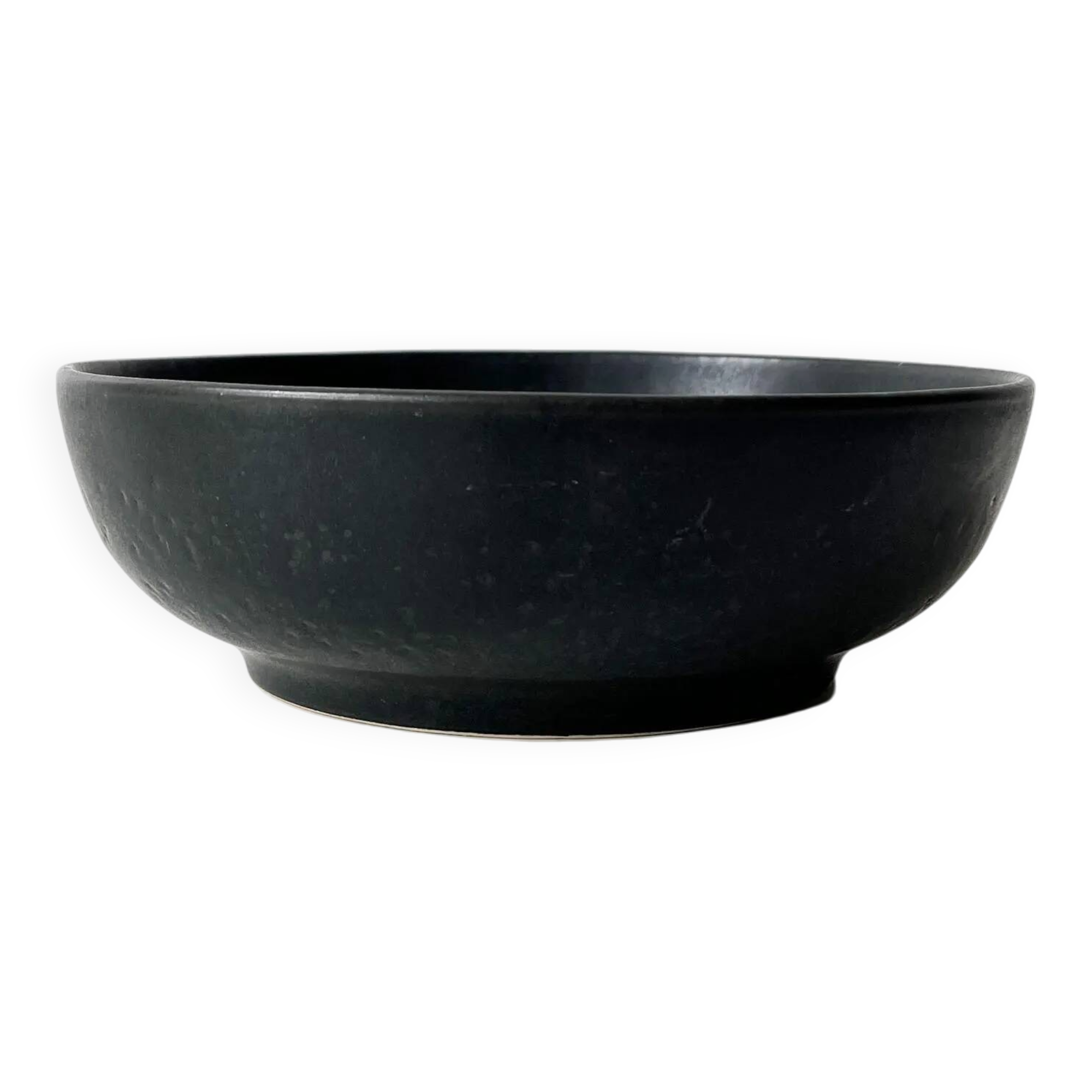 Round vintage black ceramic catchall.
