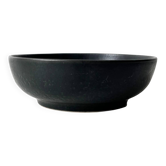 Round vintage black ceramic catchall.