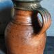 Pitcher traditional pottery Folk art in old enamelled sandstone